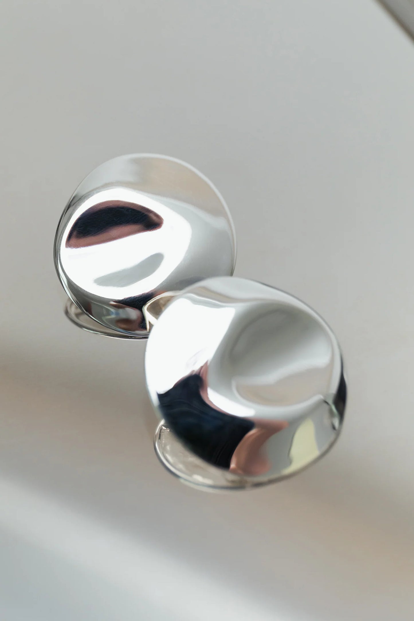 Dented Medallion Earrings in Silver