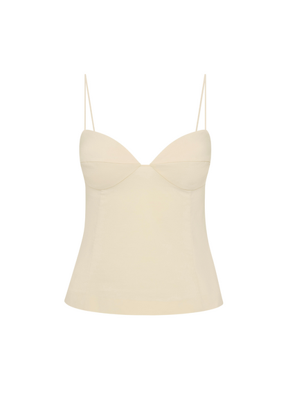 Beige slip top with thin straps on a white background