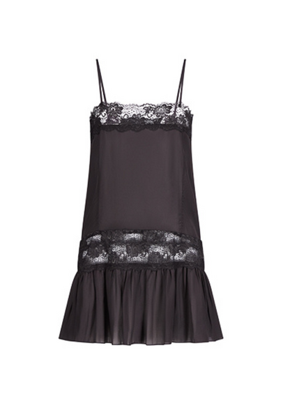 Black slip dress with lace details on a white background