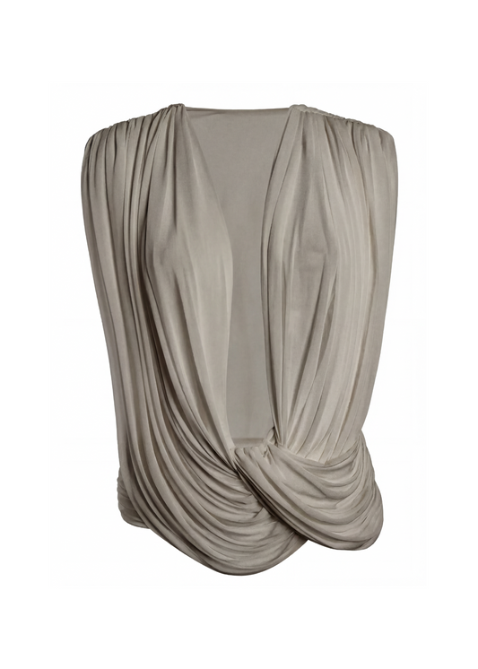 Draped beige top on a white background