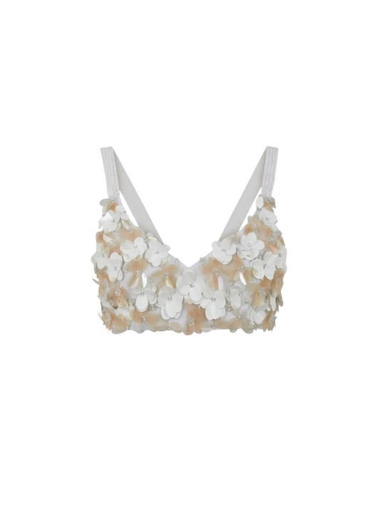 Beige and white floral lace bralette on a white background
