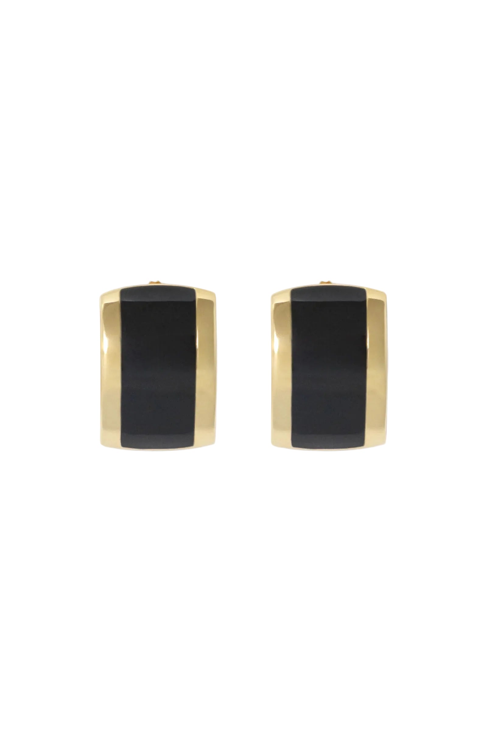 Pair of gold and black earrings on a light gray background