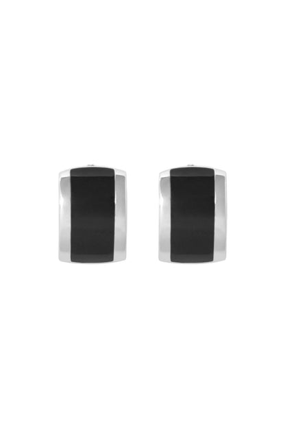 Pair of cufflinks with black and silver design on a white background