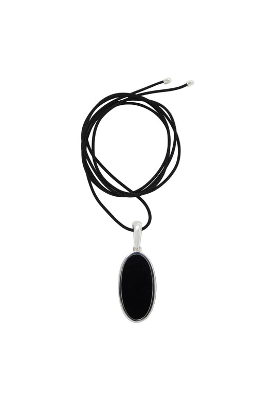 Black necklace with a pendant on a white background