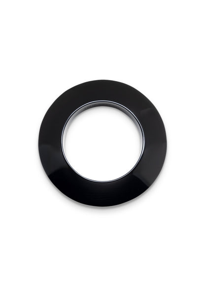 A glossy black circular ring-shaped accessory, possibly a decorative plate, coaster, or lens protector, shown on a plain white background.