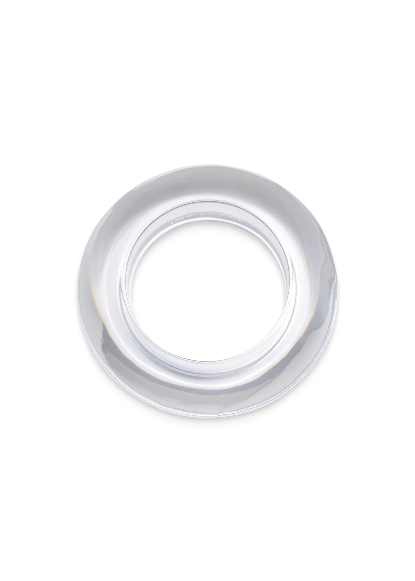 A clear, semi-transparent circular plastic ring or collar, shown from a top-down perspective on a solid white background.