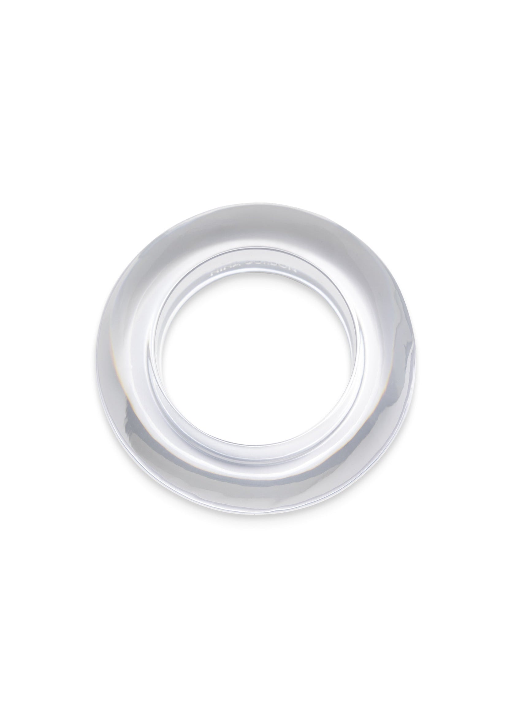 A clear, semi-transparent circular plastic ring or collar, shown from a top-down perspective on a solid white background.