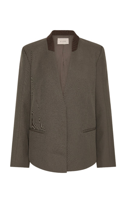 Dark green blazer with textured collar on a white background