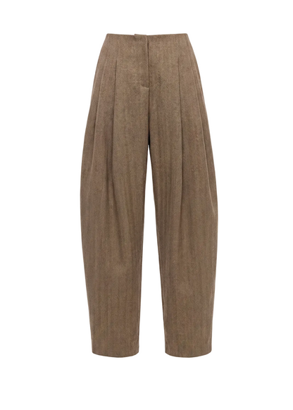 Brown pleated pants on a white background