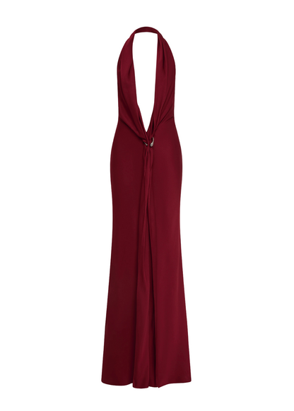 Red halter neck dress on a white background
