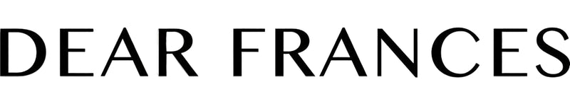 The text 'DEAR FRANCES' in a black serif typeface on a solid white background.