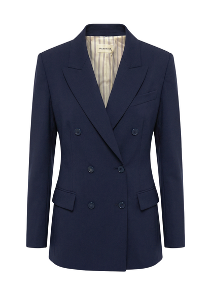 Navy blue blazer with a brand label on a white background
